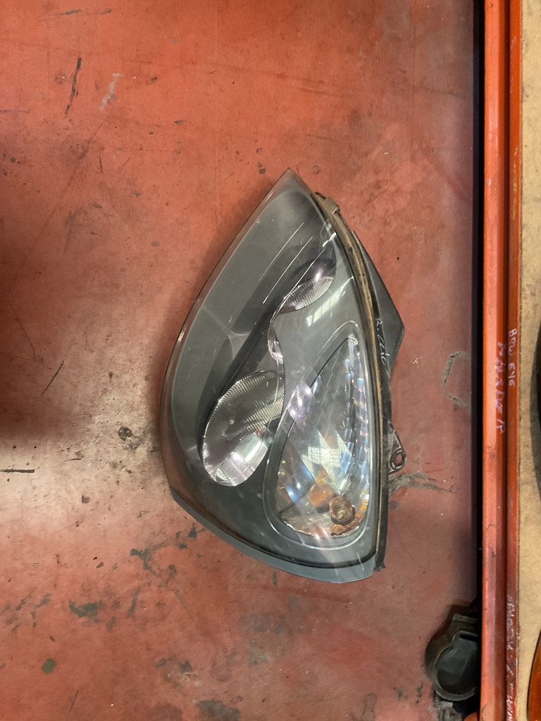 Faro izquierdo renault clio gris