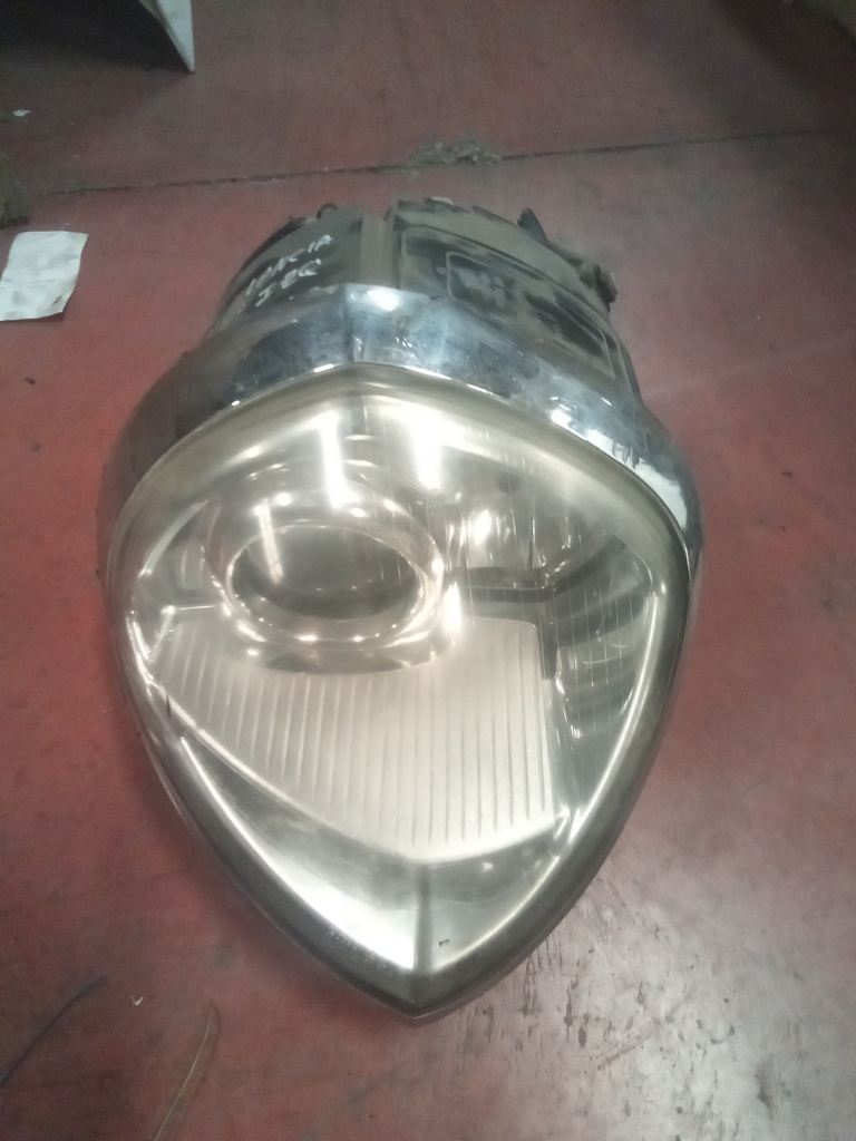 Faro derecho xenon Lancia thesis '05