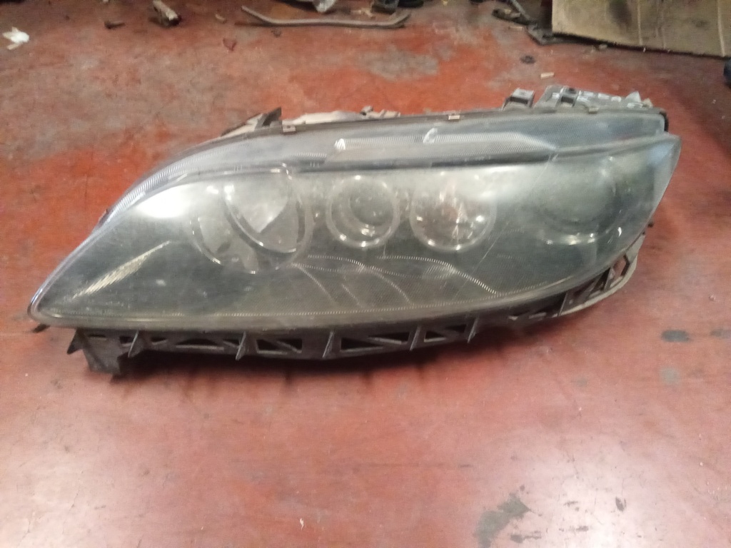 Faro izquierdo mazda 6 '05