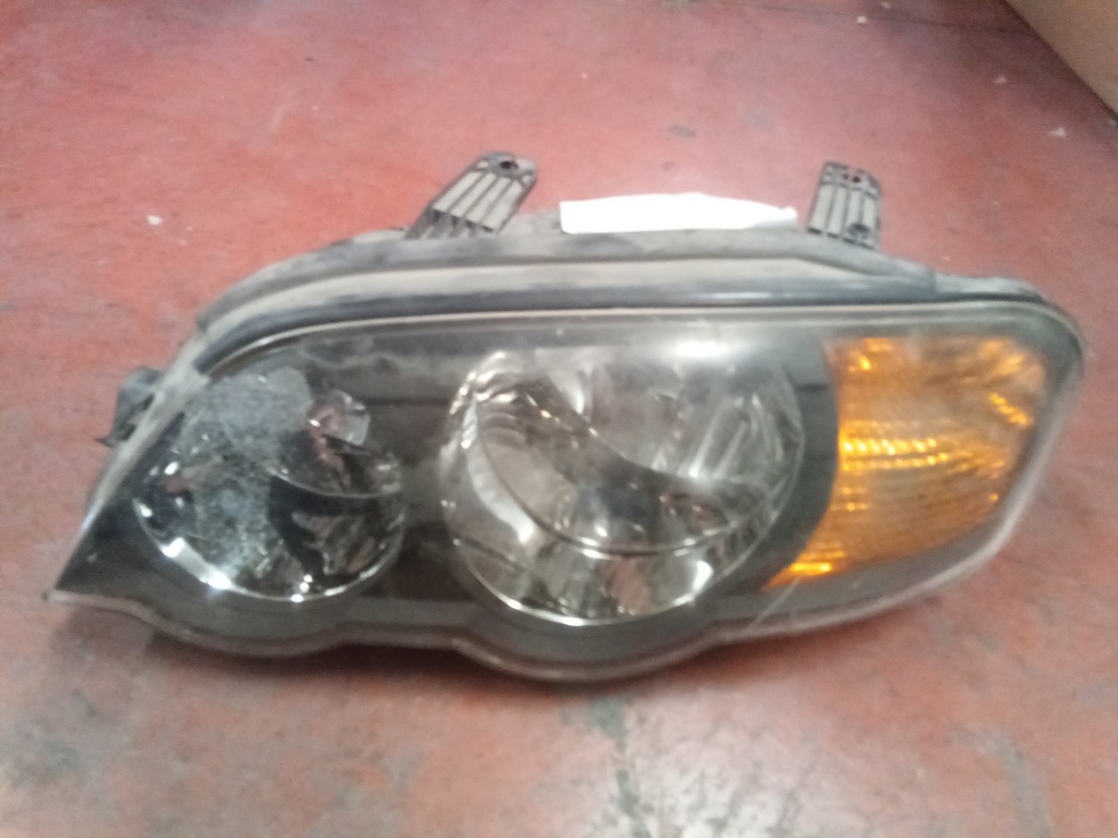 Faro izquierdo Kia shuma '02