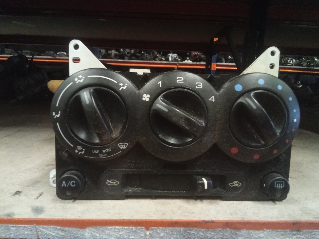 Mando aire acondicionado Suzuki ignis '03